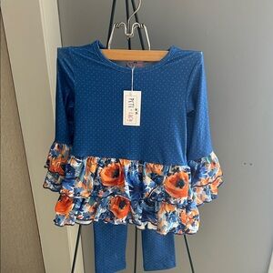 Pete + Lucy Blue Polka Dot Ruffle Outfit with Floral Accents
Size 4T